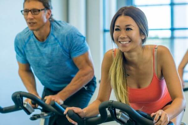 difference between stationary bikes and spin bikes